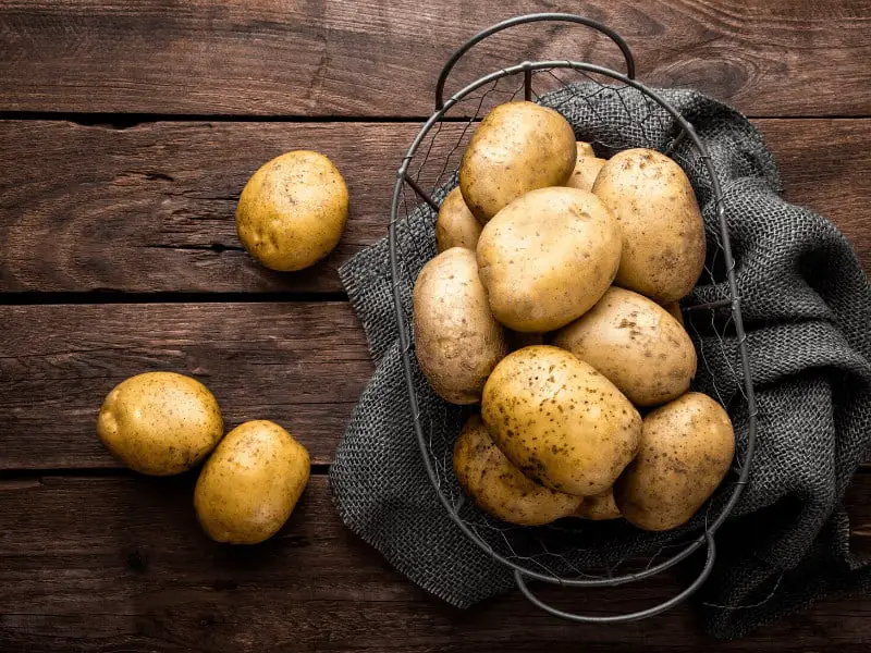 potatoes in a container ready for juicing