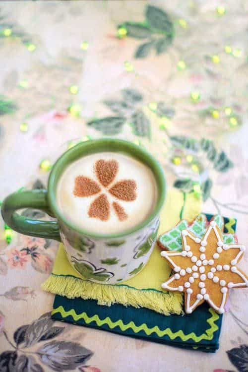 White and Green Ceramic Mug With Coffee